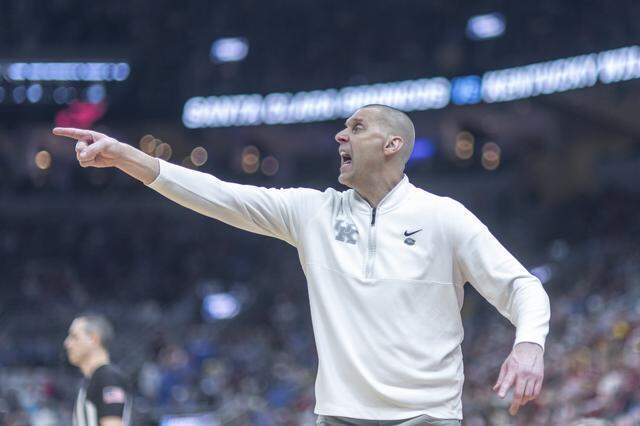 Kentucky basketball coach Mark Pope calls out instructions to his team during a game against Santa Clara in the first round of the NCAA men’s basketball tournament at Enterprise Center in St. Louis, Mo., on Friday, March 20, 2026.
